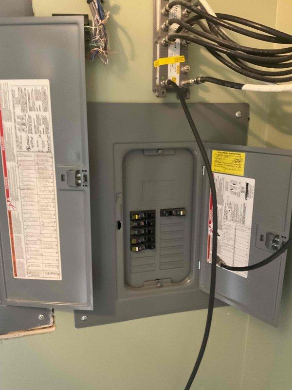 Responded to no cooling complaint on less than 10-year-old air conditioning system. Upon arrival, found unit breaker in off position following recent electrical work performed at property. Reset breaker to restore power to system. Evaluated system operation and found refrigerant charge slightly low. System now operational and cooling properly.