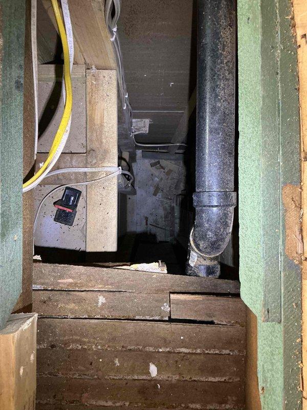 Completed comprehensive furnace inspection and system evaluation on residential HVAC unit over 15 years old that was struggling to maintain adequate heating capacity. Performed standard tune-up procedures and diagnostic assessment to determine system condition and performance issues. 

Upon inspection, identified multiple deficiencies requiring attention: aging furnace showing signs of decreased efficiency and inadequate heating output, insufficient return air ductwork on upper level causing poor air circulation and system imbalance, lack of air exchanger for proper ventilation, and overall ductwork system in need of professional cleaning. Documented existing conditions through photographs showing current return air configuration in upper level area and basement/crawlspace infrastructure including existing ductwork, plumbing, and utility components.

Based on findings, recommended complete furnace replacement due to age and performance limitations, installation of additional return air