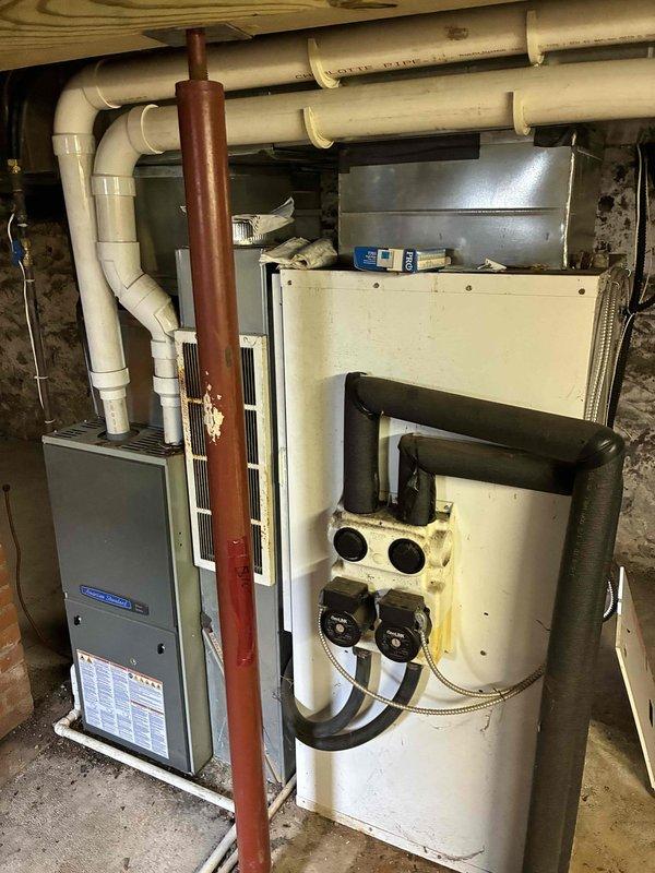 Responded to no cooling call on geothermal system. Customer reported manually jumping ECM blower motor for several weeks to initiate operation as control board was not sending signal to motor start wire. Upon arrival, found unit non-operational with no diagnostic lights illuminated, indicating failed control board. Tested compressor operation in heating mode - unit ran successfully. Attempted cooling mode operation resulted in pumps running 10-15 seconds before system lockout, but unable to determine specific fault code due to non-functioning diagnostic LED display. Verified condensate drain clear, checked loop pressures within normal range, and confirmed adequate refrigerant charge with no low pressure safety trips. Diagnosed primary failure as control board requiring replacement to restore ECM blower operation and proper system diagnostics. Advised customer that additional issues may be present but cannot be properly diagnosed until control board is replaced and diagnostic functions 