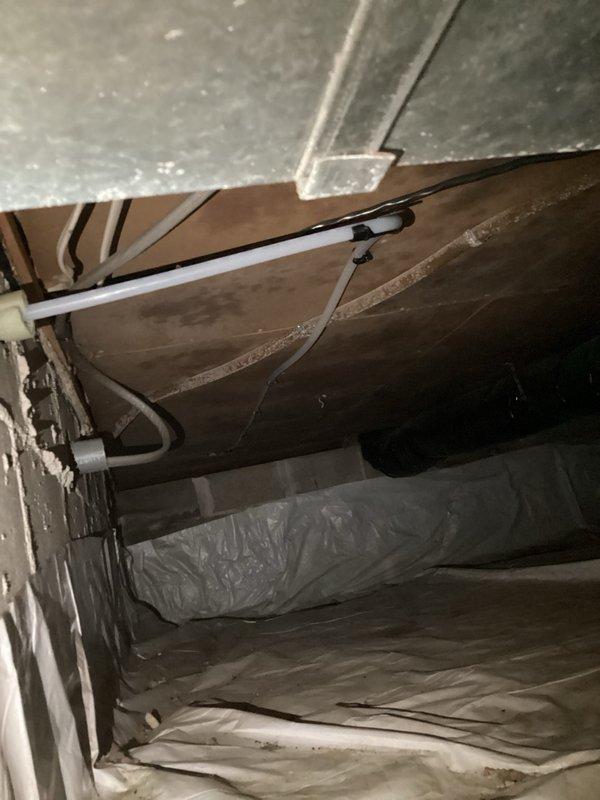 Installed freeze-proof hose bibb with up to 15 feet of PEX tubing routed through crawlspace to replace existing exterior hose bib. Medium access installation required two technicians to navigate crawlspace conditions and properly secure plumbing connections to prevent freezing in harsh weather conditions.