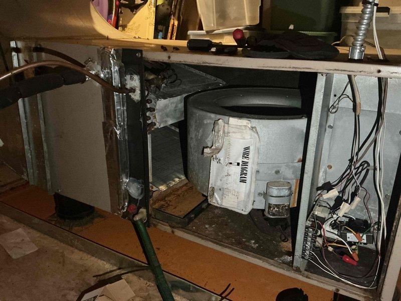 Responded to no cooling complaint on 20-year-old attic air handler system accessed via garage attic entry. Verified high voltage power supply to control board at air handler unit and tested output circuits. Diagnostics confirmed complete control board failure with no power output to system components. Documented failed control board with photographic evidence showing air handler unit and electrical connections. Submitted parts request form for repair estimate and scheduled follow-up estimate appointment for complete air handler replacement due to age and condition of existing equipment.