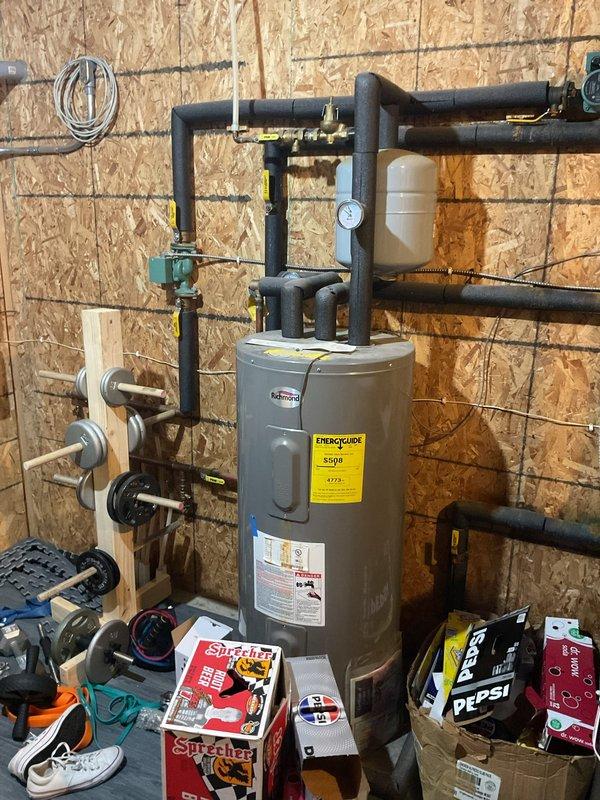 Responded to no cooling condition on geothermal heat pump system. Found failed run capacitor and hard start capacitor with burned wiring connections. Replaced both capacitors, repaired damaged wiring, and performed test run with satisfactory operation. Unit running properly at time of departure, though compressor longevity may be affected by component failures.