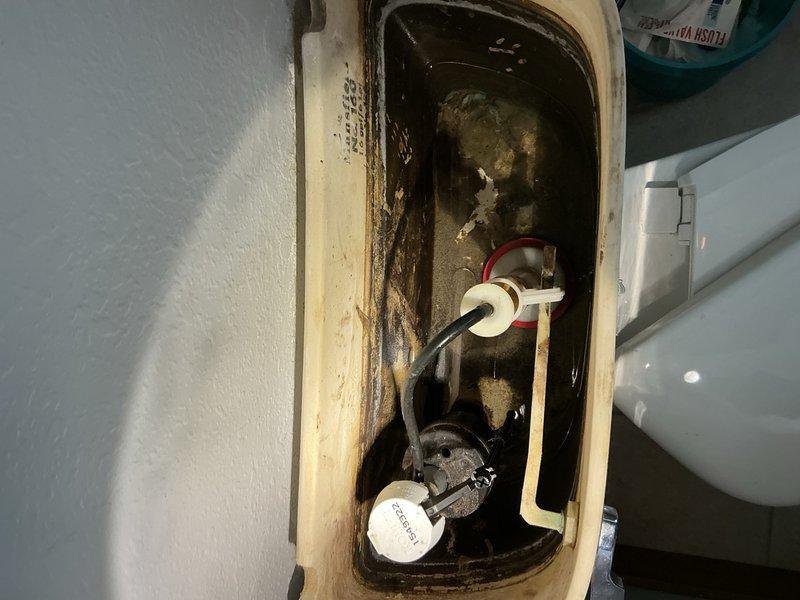 Responded to multiple toilet issues in units 8-12 where sediment accumulation in tanks caused fill valve malfunctions and gasket deterioration leading to bowl leakage. Installed two Mansfield gaskets as immediate repair solution. Documented conditions and completed parts order form for three replacement toilet units and sediment filtration system to be installed during follow-up visit later this week to address underlying water quality issue causing excessive mineral buildup.