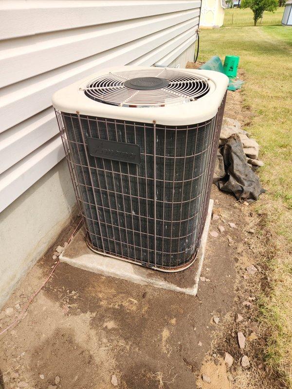 Responded to no cooling complaint on 15+ year old air conditioning system. Upon inspection, found inadequate cooling with only 10° temperature split across evaporator coil and freezing distributor tubes. Diagnostic testing revealed suction pressure at approximately 40 PSI, indicating significant refrigerant undercharge in R22 system. Due to phase-out of R22 refrigerant and age of equipment, advised customer that system replacement is most viable option. Coordinated with sales team for replacement system evaluation and pricing.