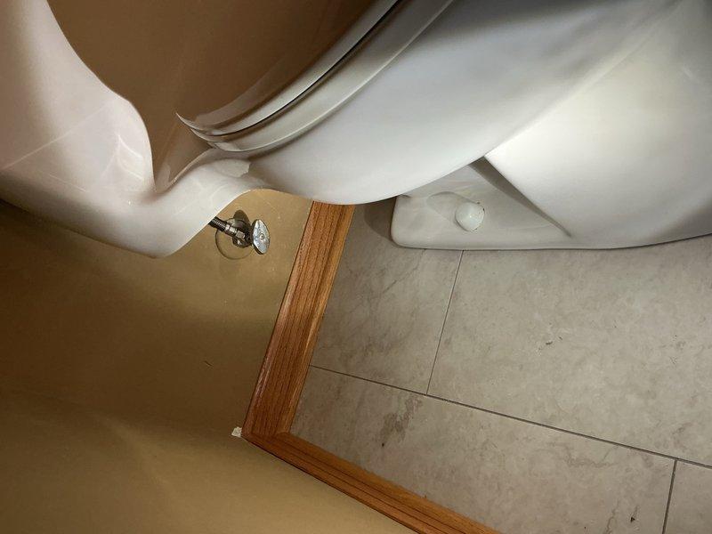 Responded to a toilet reset request following bathroom floor replacement due to previous water leak damage. Successfully reset the toilet on the newly installed tile flooring, installed a new water supply line, and performed eight flush cycles to verify proper seal and confirm no leaks were present at the base or supply connection. All fixtures tested and functioning properly upon completion.