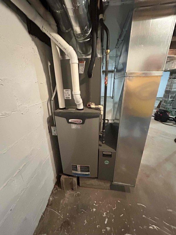 Performed comprehensive AC tune-up on Lennox system for homeowners who recently moved into the property and were starting the unit for the first time. Upon inspection, discovered system was significantly low on refrigerant charge. Discussed diagnostic findings and repair options with homeowner, who authorized addition of refrigerant and UV dye to restore system operation. Added refrigerant to manufacturer specifications, achieving proper operating pressures with 20° temperature split and 3° subcool. Injected UV dye into system for future leak detection purposes. System now operational and cooling effectively.