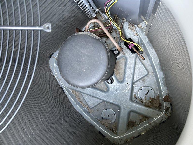 Completed comprehensive annual air conditioning tuneup and preventive maintenance service. Performed thorough system inspection beginning with indoor components, verifying air filter condition and confirming condensate drain line was flowing freely without obstructions. Proceeded to outdoor condensing unit where condenser coil was cleaned and washed to remove accumulated debris and ensure optimal heat transfer efficiency. Conducted detailed inspection of all external components including fan motor, compressor, electrical connections, and refrigerant line sets. Connected manifold gauge set to measure system pressures and temperatures across the refrigerant circuit. Verified system is operating within manufacturer specifications with proper temperature differential across the evaporator coil and adequate refrigerant charge levels. All components tested and found functioning properly with no deficiencies noted.