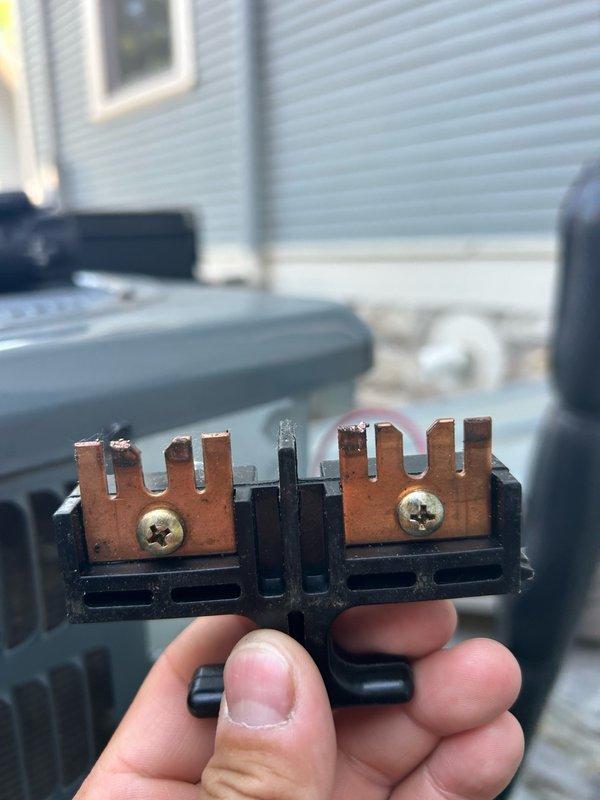 Responded to no cooling complaint and found condenser fan motor failed to operate while compressor continued running, causing system overheating and frozen evaporator coils. Tested universal capacitor which measured within acceptable range, confirming failed condenser fan motor as root cause. Identified and ordered replacement motor, secured customer approval, and disconnected power to unit to prevent compressor damage until return visit for installation and system restoration.