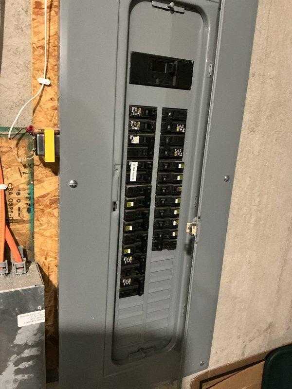 Responded to no cooling complaint on 11-year-old air conditioning system. Upon arrival, found unit not running due to low pressure safety switch activation. Bypassed low pressure switch to perform diagnostic testing of refrigerant levels. Encountered seized low side service port locking cap that could not be removed; obtained pressure readings from high side service port only. Readings confirmed system is significantly low on refrigerant charge. Identified refrigerant type as obsolete R-22, which is no longer manufactured and has limited availability at premium cost. Used digital multimeter to verify electrical components and capacitor operation within acceptable parameters. Accessed outdoor condenser unit and inspected internal wiring, contactor, and run capacitor - all components functioning properly when power supplied. Confirmed compressor attempts to run when low pressure safety is bypassed, indicating mechanical components operational but insufficient refrigerant charge preventin