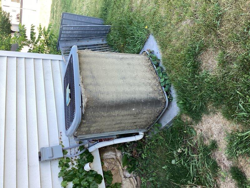Performed comprehensive preventive maintenance tune-up on 8-year-old air conditioning system. Unit exhibited heavy debris accumulation on condenser coils, which was thoroughly cleaned after disassembly. Verified system performance with 20-degree temperature differential across evaporator coil, confirming proper refrigerant charge and heat transfer. Noted MERV 16 air filter nearing saturation; homeowner will order replacement. Inspected all electrical components, mechanical operation, and safety controls—all functioning within manufacturer specifications.