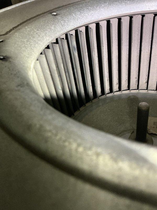Completed annual furnace and air conditioning tune-up on 22-year-old HVAC system. Performed comprehensive inspection revealing multiple components nearing end of service life. AC unit operates with R22 refrigerant and runs louder than normal. Measured compressor amperage drawing higher than specification. Identified contactor with significant pitting and burn marks requiring replacement. Discovered blower motor with oil leakage indicating bearing wear. Control board shows evidence of thermal stress with visible hot spot. Blower wheel heavily coated with dust and debris accumulation. Documented equipment condition with multimeter readings showing 39.97 μF capacitance measurement. Discussed findings with homeowner who intends to extend system operation for additional years before replacement. Recommended monitoring contactor, blower motor, and control board as priority replacement items to prevent system failure.