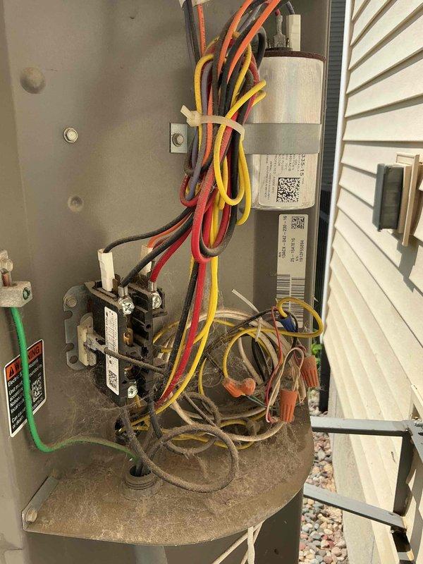 Responded to service call for reduced airflow and uneven cooling on 14-year-old Lennox air conditioning system, with upper floor experiencing inadequate cooling. Performed comprehensive system airflow balancing by adjusting two zone dampers and closing basement supply damper approximately 45 degrees to redirect conditioned air to upper levels. Reduced airflow at multiple basement registers that were fully open and contributing to unbalanced distribution. Reconfigured blower motor speed taps by switching black wire (high speed) from heating to cooling mode and brown wire (medium speed) from cooling to heating mode to increase airflow during cooling operation, as cold air requires higher CFM for proper distribution. Completed preventive maintenance tune-up including condenser coil cleaning and full system inspection. All mechanical and electrical components found operating within normal parameters. Homeowner instructed to monitor system performance and contact for speed tap re-evaluation