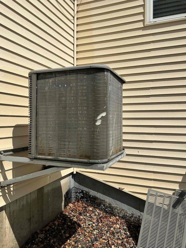 Responded to service call for reduced airflow and uneven cooling on 14-year-old Lennox air conditioning system, with upper floor experiencing inadequate cooling. Performed comprehensive system airflow balancing by adjusting two zone dampers and closing basement supply damper approximately 45 degrees to redirect conditioned air to upper levels. Reduced airflow at multiple basement registers that were fully open and contributing to unbalanced distribution. Reconfigured blower motor speed taps by switching black wire (high speed) from heating to cooling mode and brown wire (medium speed) from cooling to heating mode to increase airflow during cooling operation, as cold air requires higher CFM for proper distribution. Completed preventive maintenance tune-up including condenser coil cleaning and full system inspection. All mechanical and electrical components found operating within normal parameters. Homeowner instructed to monitor system performance and contact for speed tap re-evaluation