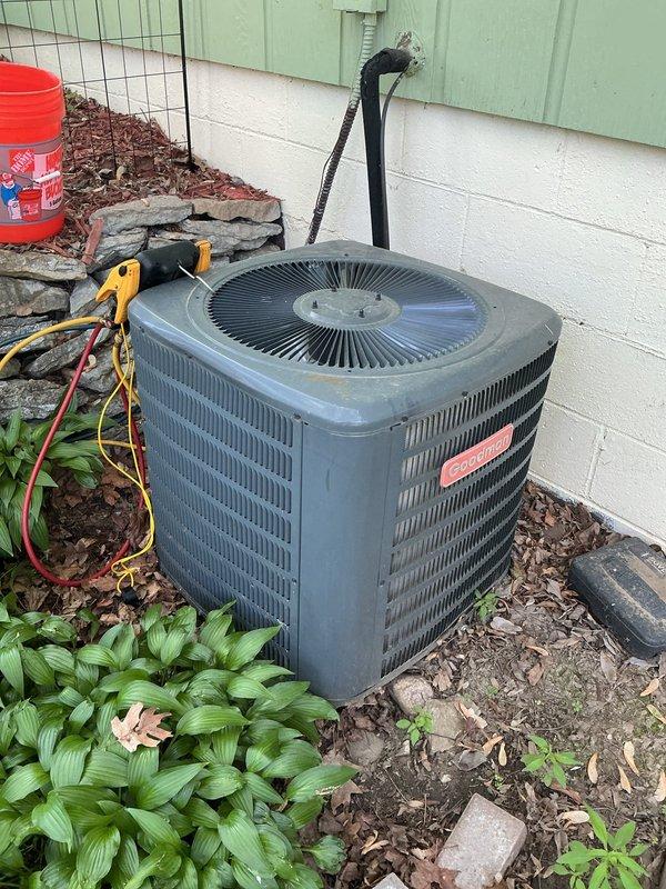 Responded to no cooling complaint on 10-year-old central air conditioning system where both condenser and air handler were reportedly not operating. Upon arrival, system powered on and ran during testing. Diagnostic evaluation revealed system is low on obsolete refrigerant and attic-mounted fan coil has severely restricted accessibility for service. Evidence suggests drain pan may have filled with condensate from frozen evaporator coil, potentially triggering safety float switch that caused initial system shutdown. Due to age of equipment, obsolete refrigerant type, and challenging service access in attic installation, scheduled same-day estimate for mini-split system replacement and removal of existing condenser unit.