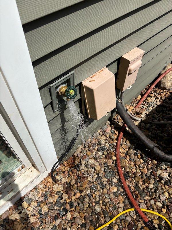 Replaced leaking backyard hose bib and interior shut-off ball valve. Removed existing outdoor faucet and installed new hose bib with proper connections. Replaced faulty interior ball valve controlling the exterior water line. System was pressurized and tested for 10 minutes under full flow conditions with no leaks detected. Work area cleaned and all connections verified secure upon completion.