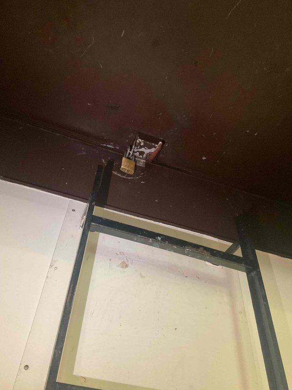 Responded to no cooling complaint at rooftop HVAC unit serving condo unit. Coordinated rooftop access through building maintenance and accessed unit via interior ceiling hatch. Diagnosed failed capacitor preventing compressor operation, resulting in warm air discharge. Replaced defective capacitor and restored cooling function to unit.