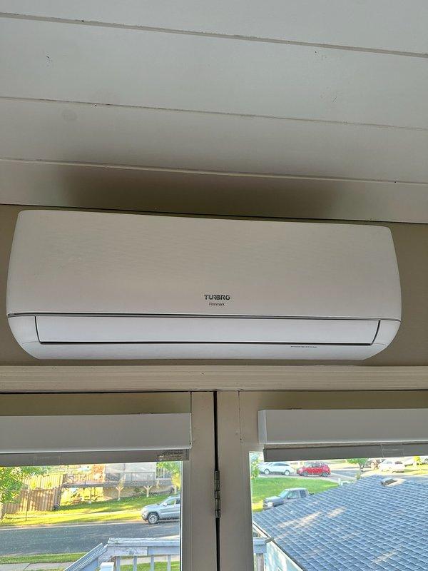Responded to no cooling complaint on 1-year-old ductless mini-split system installed on outdoor deck. Upon inspection, determined that refrigerant lines had been disturbed during recent deck board replacement, causing flare fittings to loosen and resulting in complete refrigerant loss. Diagnosed leak at connection points where outdoor unit had been temporarily relocated. Provided estimate for pressure testing system, repairing compromised flare connections, and recharging unit to factory specifications. Customer declined repair services.