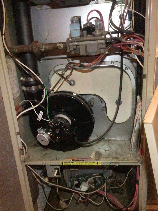Performed furnace tune-up on a 32-year-old Comfortmaster unit as requested for home sale contingency. Electrical components tested and found within specifications. Critical safety issue identified: cracks discovered on heat exchanger, documented with photographs. Due to age of unit and severity of heat exchanger failure, coordinated same-day appointment with service advisor to discuss replacement options.