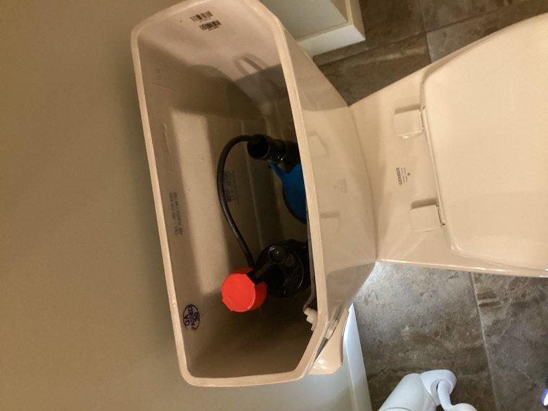 Responded to service call for two toilets cycling on and off every 30 minutes for approximately 15 seconds while not in use. Upon inspection, diagnosed leaking flappers and failing fill valves in both toilet tanks causing phantom flushing and pressure pump cycling. Removed defective components and installed new flappers and fill valves in both units. Tested flush mechanisms and verified proper operation with no leaks. Adjusted water levels and chain lengths to manufacturer specifications. Confirmed pressure pump cycling issue resolved and toilets functioning properly.
