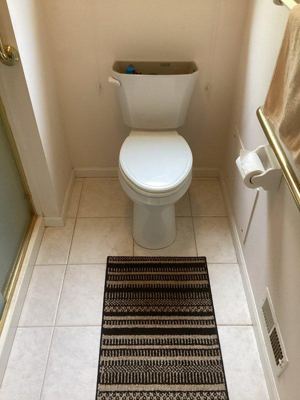 Responded to complaint of master bathroom toilet plugging frequently. Inspected toilet and drain line. Toilet is approximately six months old; customer reported previous toilet experienced same issue. Due to recurring nature of problem with multiple fixtures, recommended drain technician perform camera inspection of branch line to identify potential blockage or drainage issue in main line.
