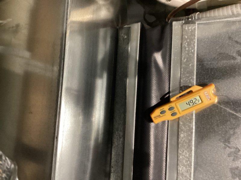 Responded to no cooling complaint on 10+ year old HVAC system with suspected electrical issues. Found severely plugged air filter restricting airflow to the system. Replaced filter, performed complete AC service including condenser coil cleaning, and verified proper operation of all electrical components and system functionality. Measured system parameters and confirmed unit returned to normal cooling operation with adequate airflow and proper refrigerant pressures.