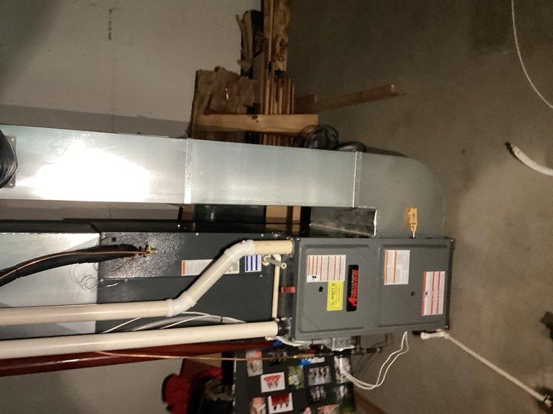 Responded to no cooling complaint on 10+ year old HVAC system with suspected electrical issues. Found severely plugged air filter restricting airflow to the system. Replaced filter, performed complete AC service including condenser coil cleaning, and verified proper operation of all electrical components and system functionality. Measured system parameters and confirmed unit returned to normal cooling operation with adequate airflow and proper refrigerant pressures.
