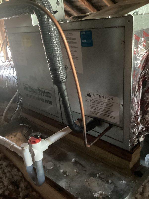 Completed preventive maintenance agreement service on residential split HVAC system with outdoor condenser unit and attic-mounted air handler. Inspected both units, verified refrigerant levels within manufacturer specifications, measured amperage draws on all components with readings in acceptable range, and replaced air filter. Both indoor and outdoor units operating properly with no deficiencies noted at time of service.