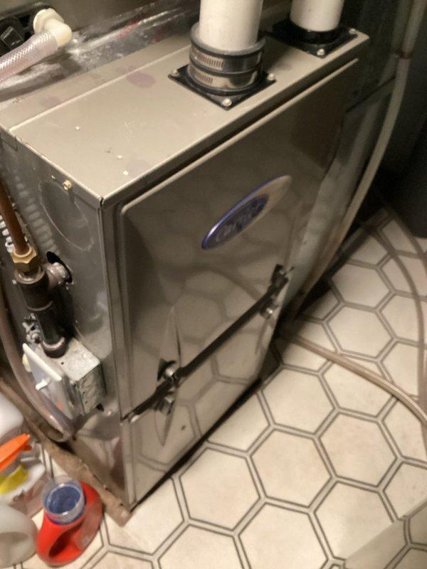 Responded to no cooling call on 10-year-old residential AC system. Upon arrival, confirmed outdoor condensing unit was receiving power but condenser fan motor was not operating. Diagnosed failed dual run capacitor preventing fan motor operation while compressor attempted to run. Removed defective capacitor, installed new OEM-spec replacement capacitor with proper microfarad ratings for both compressor and fan motor. Verified correct electrical connections and secure mounting. Tested system operation—condenser fan motor and compressor now running properly with normal amperage draw. System cooling effectively and operating within manufacturer specifications.