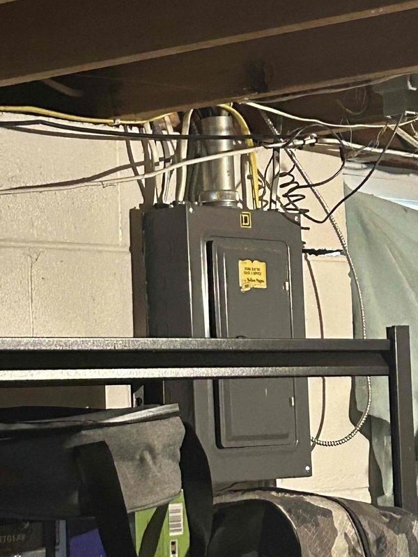Responded to no cooling complaint on 8-year-old central air conditioning system where outdoor fan was not spinning and unit was producing intermittent whooshing sounds. Upon inspection, diagnosed failed run capacitor as cause of system failure. Replaced defective capacitor with new unit, restoring proper operation to both indoor and outdoor components. Verified system performance with temperature split measuring approximately 20 degrees across evaporator coil, confirming adequate cooling capacity and proper refrigerant charge.