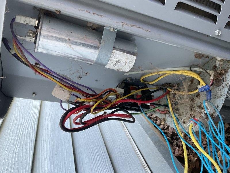 Responded to no cooling call on 10-12 year old air conditioning system. Upon arrival, diagnosed failed dual run capacitor reading zero microfarads, causing compressor to draw excessive amperage and trip the circuit breaker. Removed and replaced defective capacitor with proper rated replacement. Performed condenser coil cleaning to remove accumulated dirt and debris, improving heat transfer efficiency. Verified proper system operation, confirmed normal amperage draw, and tested all safety controls. Unit restored to full cooling capacity.