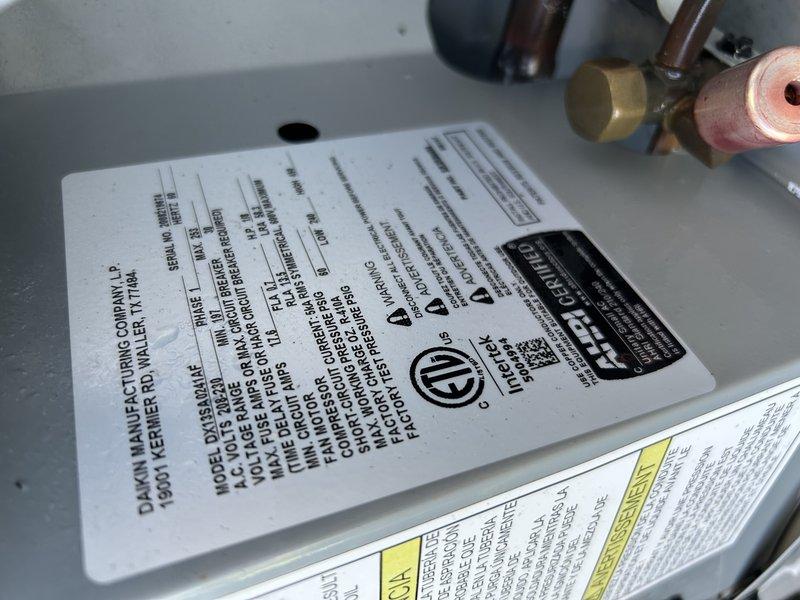 Responded to no cooling complaint on upper level of residence with 4-5 year old system. Upon arrival, inspected indoor air handler and discovered humidifier bypass damper was positioned in winter mode, restricting proper airflow. Corrected damper position to summer mode for optimal circulation. Verified air filter was clean and in acceptable condition.

Proceeded to outdoor condenser unit and found significant debris accumulation on condenser coil affecting heat transfer efficiency. Verified capacitor tested within acceptable range and all electrical connections were secure. Performed thorough condenser coil cleaning to remove dirt, dust, and debris buildup from fins and coil surfaces.

Following cleaning, conducted system performance testing including refrigerant pressure and temperature measurements. All pressures and temperatures measured within manufacturer specifications, confirming system is operating properly with adequate refrigerant charge. Adjusted thermostat fan setting from