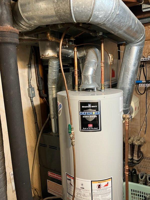 Responded to service call for equipment inspection and furnace maintenance at residential property. Investigated dryer vent configuration and found metal flex duct connected to vinyl flex duct transitioning to rigid duct at exterior termination. Identified vinyl flex duct section as non-compliant with code requirements and referred homeowner to duct cleaning specialist for proper remediation. Inspected exhaust drop tee exhibiting surface rust and corrosion but confirmed structural integrity remains intact with no compromise to functionality.

Performed comprehensive tune-up on five-year-old Goodman furnace system. Conducted full system diagnostics including component function testing, flame sensor cleaning, and combustion analysis. Verified all operational parameters within manufacturer specifications. System operating properly with no deficiencies identified and no recommendations required at this time.
