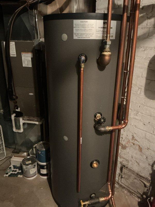 Responded to no cooling complaint on main floor air conditioning system. Upon inspection, found system operating with low refrigerant charge of obsolete refrigerant type, resulting in evaporator coil freeze-up and restricted airflow at basement-located air handler. Documented system age exceeding 10 years and obsolete refrigerant requiring specialized handling. Explained to customer that refrigerant is no longer readily available and system condition warrants replacement rather than repair. Photographed existing air handler and mechanical room equipment for documentation purposes. Scheduled replacement estimate appointment for new air conditioning system and air handler installation.