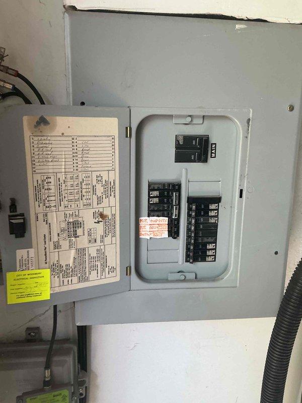 Responded to no cooling call on 32-year-old Lennox R22 air conditioning system with indoor fan operational but outdoor unit not running. Found tripped breaker at electrical panel, reset breaker and confirmed outdoor unit operation. Performed amp draw testing which revealed compressor drawing higher than normal amperage relative to ambient temperature conditions, indicating internal compressor wear. Attempted refrigerant pressure diagnostics but high-side service port was inaccessible; low-side pressure reading suggested system is slightly undercharged on R22 refrigerant. Due to age of equipment, compressor wear indicators, and EPA regulations prohibiting major repairs on R22 systems, recommended full system replacement and scheduled follow-up consultation for replacement options.