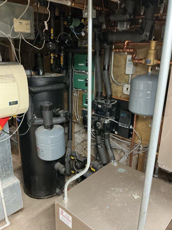 Completed comprehensive plumbing inspection of residential property. Inspected water heater, expansion tanks, circulation pump, copper supply lines, PVC drainage systems, shut-off valves, and all visible plumbing connections in basement mechanical areas. All systems were documented photographically, and detailed findings were provided in the inspection report.