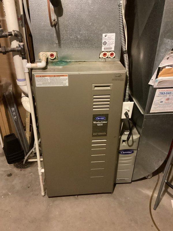 Responded to no cool call on 21-year-old central air conditioning system. Upon inspection, diagnosed failed dual run capacitor and defective condenser fan motor preventing unit operation. Provided repair estimate for capacitor and fan motor replacement. Scheduled separate system replacement consultation due to age of equipment and noted Carrier WeatherMaker 9200 furnace also nearing end of service life with known model reliability concerns.