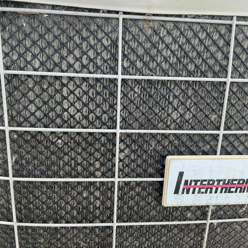Responded to no cooling call on 22-year-old Nordyne air conditioning system. Upon arrival, discovered abnormally high head pressure with no visible restrictions in the refrigerant circuit. Inspected condenser coil, which was clean with minor fin damage insufficient to restrict airflow. Measured compressor amp draw at near maximum rated capacity, indicating imminent compressor failure. Noted presence of utility saver switch that reportedly cycles system off at same time daily during peak demand periods, which may be contributing to perceived failure symptoms. However, diagnostic testing confirmed system is exhibiting clear signs of end-of-life compressor degradation independent of demand management cycling. Reviewed replacement options with homeowner and scheduled follow-up consultation with service advisor for system replacement recommendations.