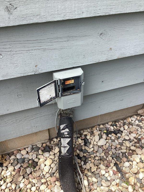 Responded to no cooling call on aging air conditioning system with no recent maintenance history. Upon inspection, discovered blown wire at exterior disconnect box, along with failed contactor and capacitor. Identified these failed electrical components as preventing system operation and requiring replacement to complete full system diagnostic and restore cooling function.