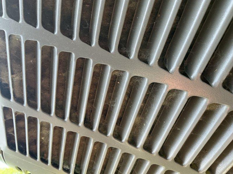 Performed comprehensive air conditioning tuneup on a 4-year-old Lennox system. Cleaned exterior condenser coils to remove accumulated dirt and debris, inspected all electrical components and connections, and verified refrigerant charge levels. System operating within normal parameters with no deficiencies noted.