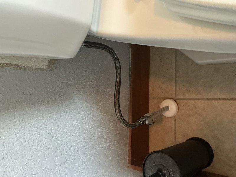 Replaced three standard height toilets with new units including wax rings, mounting bolts, and complete installation. Installed a 20-inch whole house sediment and rust filter with 1-inch inline connection to address excessive sand and sediment contamination affecting plumbing fixtures throughout the residence. Replaced one toilet shut-off valve and supply line to prevent future water damage and ensure proper emergency shut-off capability. All installations completed to manufacturer specifications with filter system designed to capture sediment, dirt, and rust particles, protecting fixtures from mineral damage and staining while improving water quality.