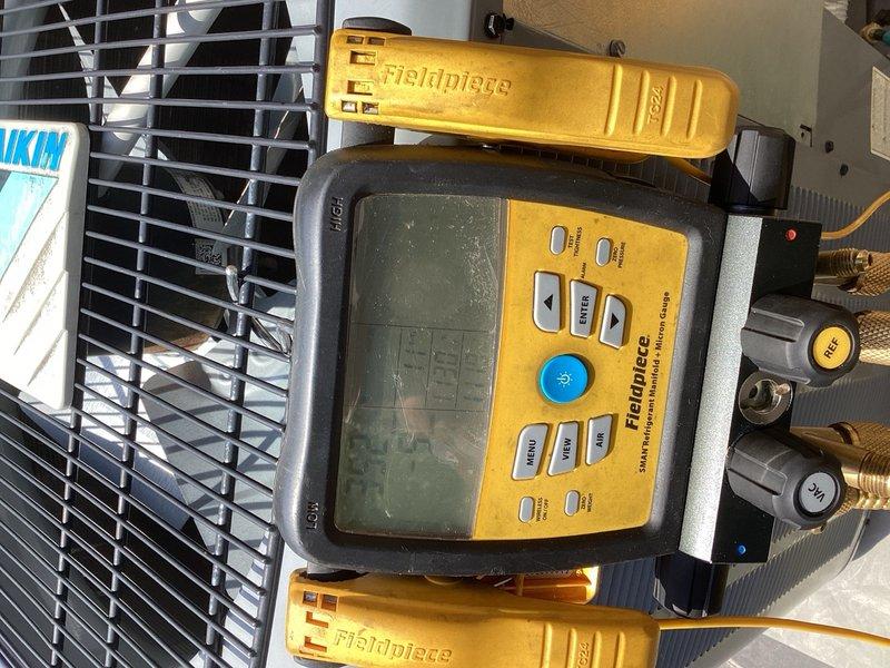 Located and diagnosed refrigerant leak in the evaporator coil of the air handler unit located in walk-in attic. Recovered contaminated refrigerant from system and removed failed evaporator coil. Installed new horizontal left evaporator coil with TXV for 410A refrigerant system. Pressure tested system to verify leak-free installation, evacuated system to proper vacuum levels, and recharged with 410A refrigerant to manufacturer specifications. Cycled system through complete operational test and verified proper cooling performance. All work completed with condenser access via ladder to balcony location.