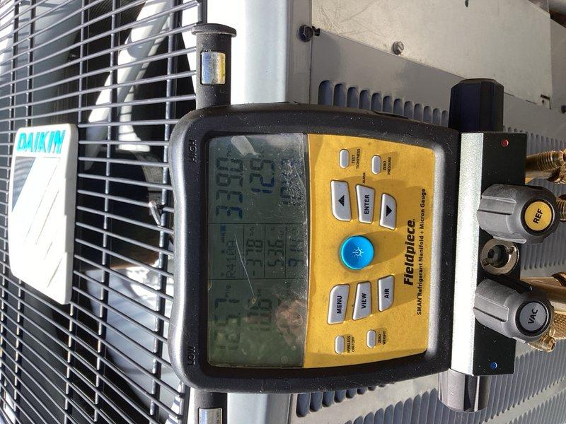 Located and diagnosed refrigerant leak in the evaporator coil of the air handler unit located in walk-in attic. Recovered contaminated refrigerant from system and removed failed evaporator coil. Installed new horizontal left evaporator coil with TXV for 410A refrigerant system. Pressure tested system to verify leak-free installation, evacuated system to proper vacuum levels, and recharged with 410A refrigerant to manufacturer specifications. Cycled system through complete operational test and verified proper cooling performance. All work completed with condenser access via ladder to balcony location.