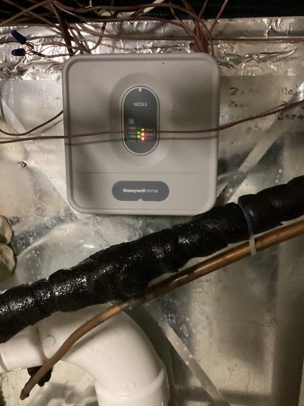Responded to service call for HVAC zoning system malfunction where dampers were not opening fully, restricting airflow throughout the home. Replaced defective Honeywell Home zone control board with new unit sourced from local supply house. After installation, verified all zone dampers now operate and open to full position. However, upon completion testing identified secondary issue with inadequate airflow to master bedroom despite proper damper operation, indicating potential ductwork restriction or additional system component requiring further diagnosis.