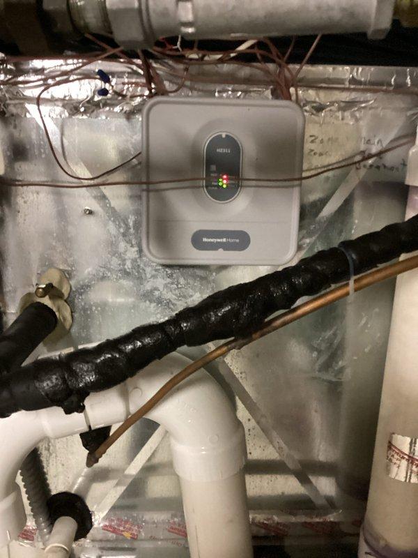 Responded to service call for HVAC zoning system malfunction where dampers were not opening fully, restricting airflow throughout the home. Replaced defective Honeywell Home zone control board with new unit sourced from local supply house. After installation, verified all zone dampers now operate and open to full position. However, upon completion testing identified secondary issue with inadequate airflow to master bedroom despite proper damper operation, indicating potential ductwork restriction or additional system component requiring further diagnosis.