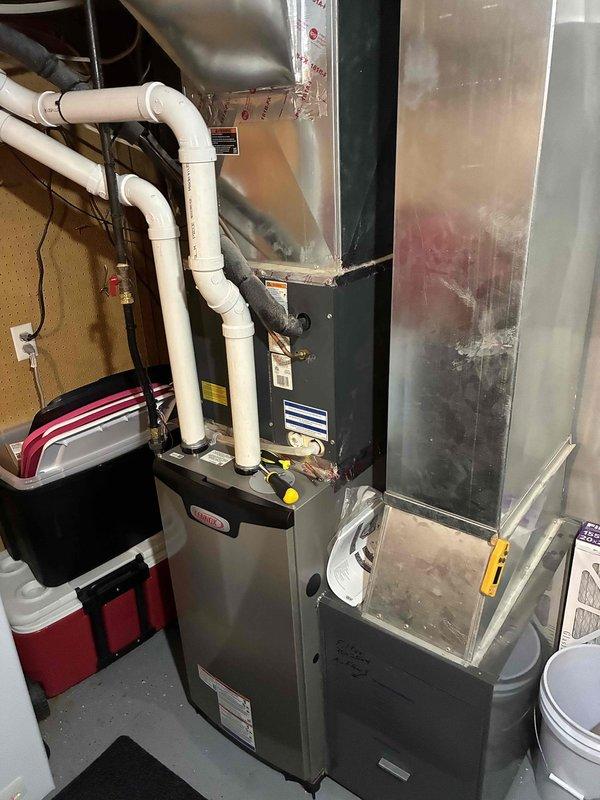 Performed comprehensive AC preventive maintenance on Lennox system. Cleaned outdoor condenser coil and inspected electrical components including capacitor, contactor, and fan motor, all testing within manufacturer specifications. Replaced air filter and cleared condensate drain line. Verified system performance with temperature differential measurement of 19 degrees across evaporator coil, confirming proper refrigerant charge and airflow. System operating normally with no deficiencies noted.
