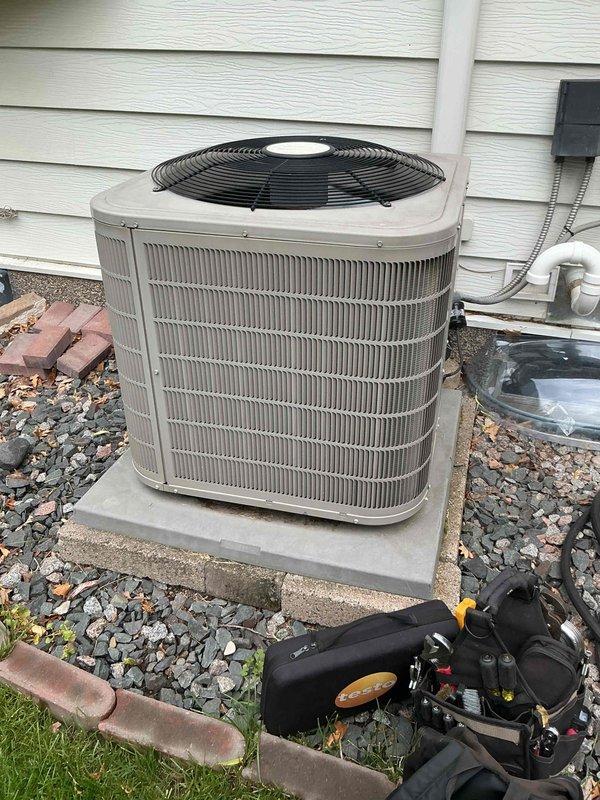 Completed annual cooling maintenance on a 13-year-old Carrier air conditioning system. Performed comprehensive inspection including contactor, capacitor, condenser coil cleaning, refrigerant charge verification, and amp draw testing. Found fan capacitor showing weak performance and advised customer of potential risk to fan motor if not replaced, but customer elected to monitor at this time. Verified air filter, blower wheel, evaporator coil, control board, and temperature drop all within acceptable specifications.