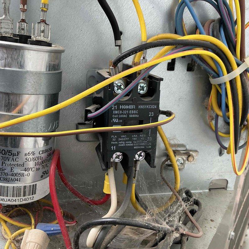 Completed annual cooling maintenance on a 13-year-old Carrier air conditioning system. Performed comprehensive inspection including contactor, capacitor, condenser coil cleaning, refrigerant charge verification, and amp draw testing. Found fan capacitor showing weak performance and advised customer of potential risk to fan motor if not replaced, but customer elected to monitor at this time. Verified air filter, blower wheel, evaporator coil, control board, and temperature drop all within acceptable specifications.