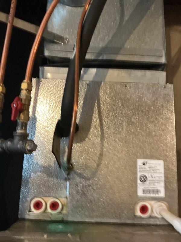 Completed scheduled air conditioning tuneup on approximately 20-year-old R22 system for new customer. During maintenance inspection, identified multiple critical issues including failed heat exchanger on furnace, severely pitted contactor, delayed compressor start time exceeding one minute, and compressor drawing near maximum amperage. Documented equipment condition with photos and recommended comfort advisor consultation for system evaluation. Advised installation of hard start kit and contactor replacement to address immediate electrical and starting concerns.