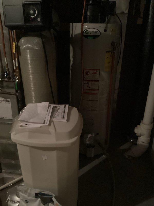 Completed biannual plumbing tune-up inspection including comprehensive water heater examination and system evaluation. Inspected A.O. Smith water heater, water softener system with control head, and associated copper and PVC piping for proper operation and potential issues. Verified all plumbing components, connections, and mechanical systems are functioning correctly for continued reliable service.