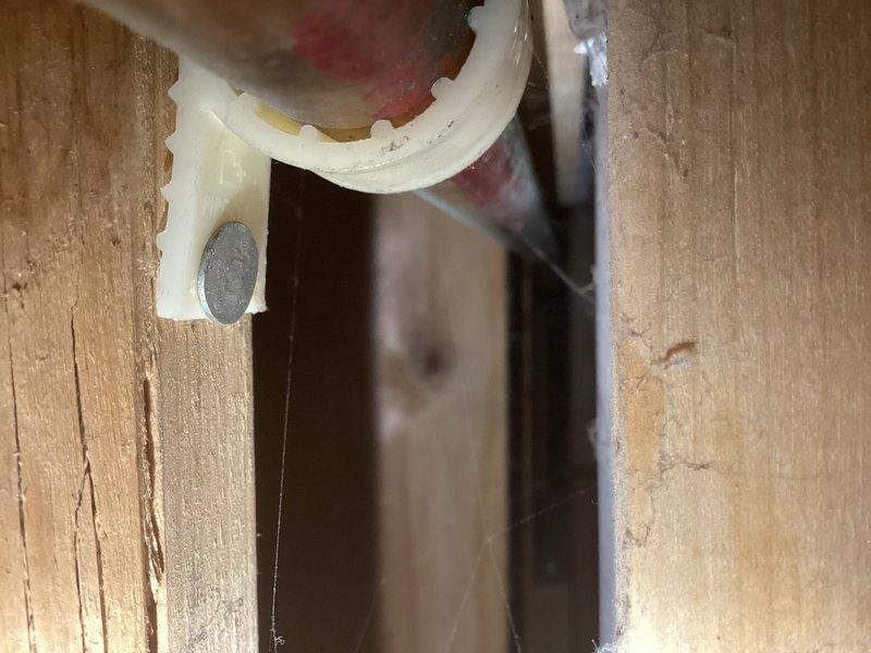 Conducted site assessment to provide estimate for repiping outdoor hose bibs to bypass water softener system, allowing untreated hard water supply for exterior irrigation. Inspected existing plumbing configuration through ceiling access panel, identifying current hose bib connections running through soft water lines. Evaluated feasibility of eliminating existing hose bib connections, adapting current lines to PEX, and routing new supply lines through mechanical room to tie in upstream of water treatment system. Assessed coordination opportunity with planned bathroom shower demolition due to existing leak damage, which would provide optimal access for running new water lines through ceiling cavity with minimal additional penetrations. Documented existing copper and galvanized steel piping configuration with shutoff valves, pipe routing through floor joists, and access points for proposed work. Provided comprehensive estimate options for either adding new dedicated water line to hose bib
